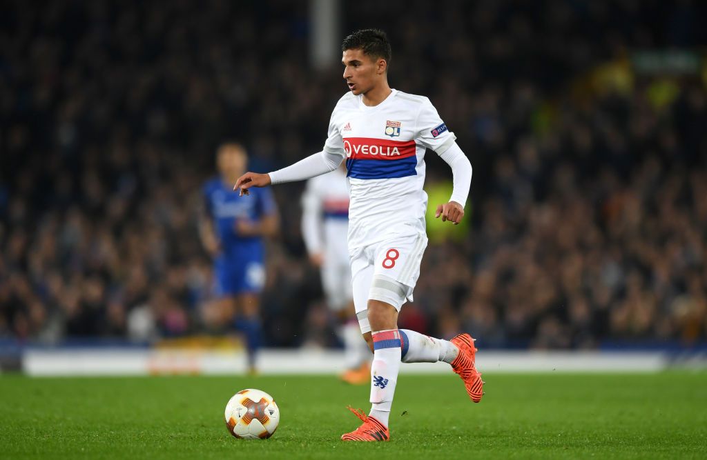 LISBON, PORTUGAL - AUGUST 15: Houssem Aouar of Olympique Lyon celebrates following his team's victory in the UEFA Champions League Quarter Final match between Manchester City and Lyon at Estadio Jose Alvalade on August 15, 2020 in Lisbon, Portugal. (Photo by Franck Fife/Pool via Getty Images)