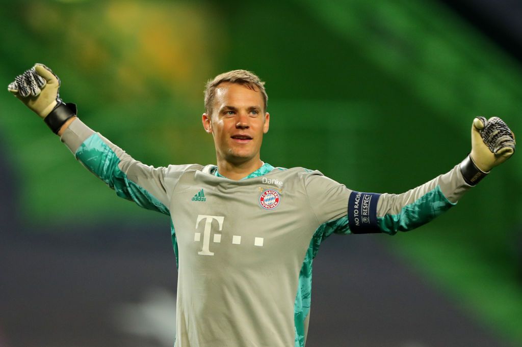 LISBON, PORTUGAL - AUGUST 19: Manuel Neuer of Bayern Munich celebrates after his teammate Robert Lewandowski of Bayern Munich (not pictured) scored their team's third goal during the UEFA Champions League Semi Final match between Olympique Lyonnais and Bayern Munich at Estadio Jose Alvalade on August 19, 2020 in Lisbon, Portugal. (Photo by Miguel A. Lopes/Pool via Getty Images)