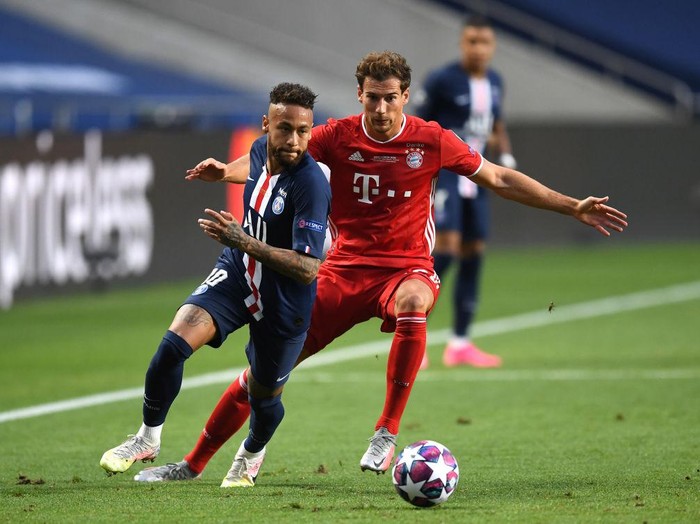 LISBON, PORTUGAL - AUGUST 23: Kylian Mbappe of Paris Saint-Germain takes on Joshua Kimmich of FC Bayern Munich during the UEFA Champions League Final match between Paris Saint-Germain and Bayern Munich at Estadio do Sport Lisboa e Benfica on August 23, 2020 in Lisbon, Portugal. (Photo by Miguel A. Lopes/Pool via Getty Images)