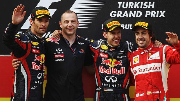 ISTANBUL, TURKEY - MAY 08: Race winner Sebastian Vettel (2nd right) of Germany and Red Bull Racing celebrates on the podium with second placed Mark Webber (left) of Australia and Red Bull Racing, third placed Fernando Alonso (right) of Spain and Ferrari and Red Bull Racing team mate Mark Ellis (2nd left) following the Turkish Formula One Grand Prix at the Istanbul Park circuit on May 8, 2011 in Istanbul, Turkey. (Photo by Bryn Lennon/Getty Images)