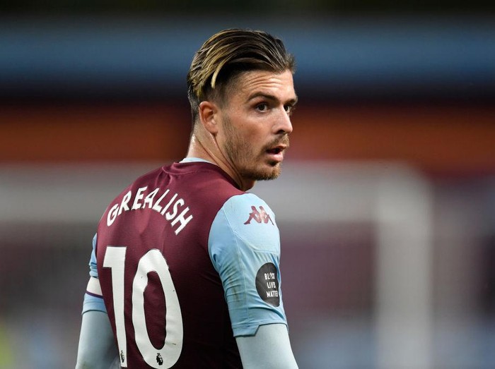BIRMINGHAM, ENGLAND - JULY 21: Jack Grealish of Aston Villa looks on during the Premier League match between Aston Villa and Arsenal FC at Villa Park on July 21, 2020 in Birmingham, England. Football Stadiums around Europe remain empty due to the Coronavirus Pandemic as Government social distancing laws prohibit fans inside venues resulting in all fixtures being played behind closed doors. (Photo by Peter Powell/Pool via Getty Images)