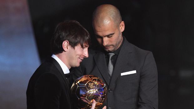 ZURICH, SWITZERLAND - JANUARY 10:  Lionel Messi (l) of Argentina and Barcelona FC receives the men's player of the year award from his club coach Pep Guardiola (r) during the FIFA Ballon d'or Gala at the Zurich Kongresshaus on January 10, 2011 in Zurich, Switzerland.  (Photo by Michael Steele/Getty Images)