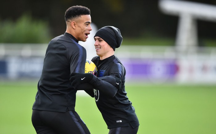 BURTON-UPON-TRENT, ENGLAND - NOVEMBER 11: Phil Foden and Mason Greenwood of England U21s takes part in a training session at St Georges Park on November 11, 2019 in Burton-upon-Trent, England. (Photo by Nathan Stirk/2019 Getty Images)
