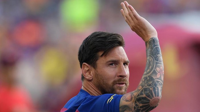 (FILES) In this file photo taken on August 4, 2019 Barcelonas Argentinian forward Lionel Messi waves before the 54th Joan Gamper Trophy friendly football match between Barcelona and Arsenal at the Camp Nou stadium in Barcelona. - Lionel Messi has informed Barcelona he wants to unilaterally terminate his contract with the Spanish giants, a club source confirmed to AFP on August 25, 2020. Lawyers for the Argentina star sent Barca a fax in which they announced Messis desire to rescind his contract by triggering a release clause, sending shockwaves throughout the world of football. (Photo by Josep LAGO / AFP)
