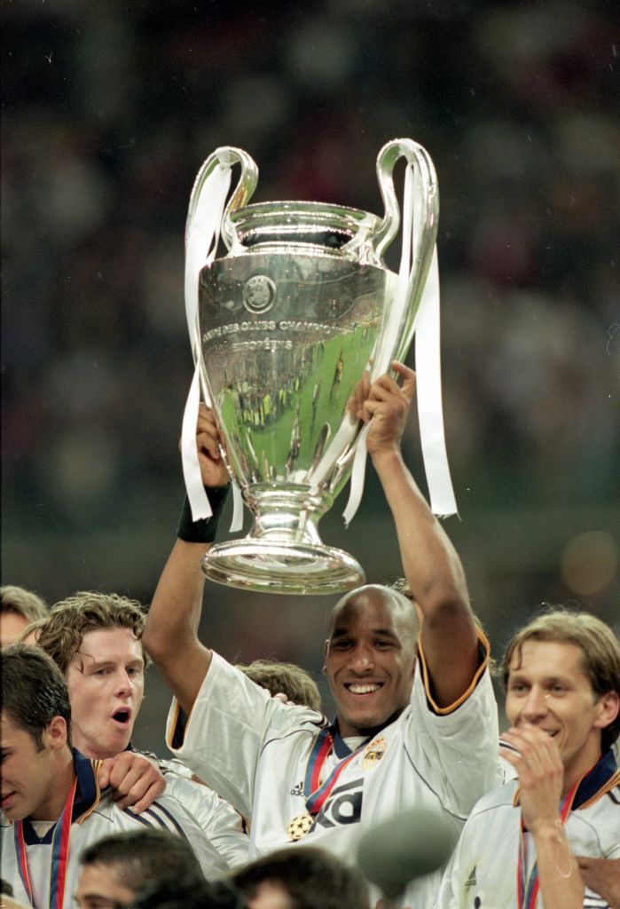 9 May 2000:  Nicolas Anelka of Real Madrid goes past Patrik Angersson of Bayern during the Bayern Munich v Real Madrid Champions League Semi-Final second leg at the Olympic Stadium, Munich, Germany. Mandatory Credit: Ross Kinnaird/ALLSPORT