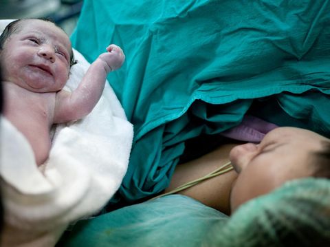 Newborn child seconds and minutes after birth.