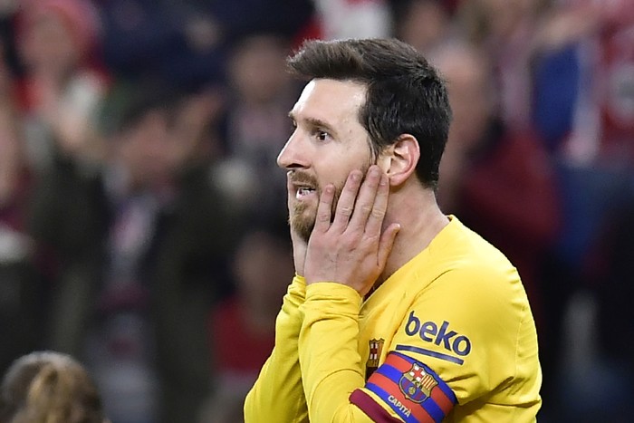 FILE - In this Feb. 6, 2020 file photo, Barcelonas Lionel Messi reacts during the Spanish Copa del Rey, quarter final, soccer match against Athletic Bilbao at the San Mames stadium in Bilbao, Spain. Lionel Messi has told Barcelona he wants to leave the club after nearly two decades with the Spanish giants. The club has confirmed that the Argentina great has sent a note expressing his desire to leave. The announcement comes 11 days after Barcelonas humiliating 8-2 loss to Bayern Munich in the Champions League quarterfinals, one of the worst in the players career and in the clubs history. (AP Photo/Alvaro Barrientos, File)