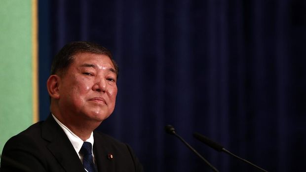 Japan's former defence minister Shigeru Ishiba speaks during a debate for the Liberal Democratic Party presidential election with Prime Minister Shinzo Abe at Japan National Press Club in Tokyo on September 14, 2018. (Photo by Behrouz MEHRI / AFP)