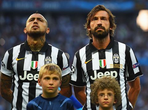 BERLIN, GERMANY - JUNE 06:  Arturo Vidal and Andrea Pirlo of Juventus line up prior to the UEFA Champions League Final between Juventus and FC Barcelona at Olympiastadion on June 6, 2015 in Berlin, Germany.  (Photo by Shaun Botterill/Getty Images)