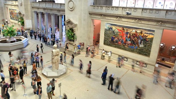 NEW YORK, NEW YORK - AUGUST 29: People roam around the entrance on reopening day at The Metropolitan Museum of Art (The Met) on August 29, 2020 in New York City. Museums and cultural institutions around the city have been closed since mid March due to the ongoing coronavirus pandemic.   Michael Loccisano/Getty Images/AFP