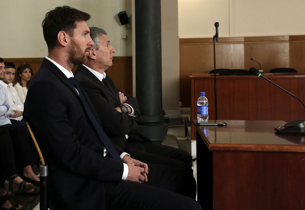 BARCELONA, SPAIN - JUNE 02:  Lionel Messi of FC Barcelona and his father Jorge Horacio Messi seen inside the court during the third day of the trial on June 2, 2016 in Barcelona, Spain. Lionel Messi and his father Jorge Messi, who manages his financial affairs, are accused of defrauding the Spanish Tax Agency of 4.1 million Euros ($4.6 million, £3.2 million) by using companies based in tax havens such as Belize and Uruguay to conceal earnings from image rights during years 2007 to 2009.  (Photo by Alberto Estevez - Pool/Getty Images)