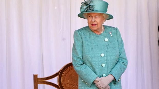 Britain's Queen Elizabeth II attends a ceremony to mark her official birthday at Windsor Castle in Windsor, southeast England on June 13, 2020, as Britain's Queen Elizabeth II celebrates her 94th birthday this year. (Photo by Paul EDWARDS / POOL / AFP)