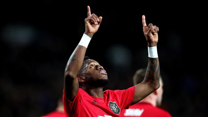 MANCHESTER, ENGLAND - FEBRUARY 27: Fred of Manchester United celebrates after scoring his teams fourth goal during the UEFA Europa League round of 32 second leg match between Manchester United and Club Brugge at Old Trafford on February 27, 2020 in Manchester, United Kingdom. (Photo by Clive Brunskill/Getty Images)