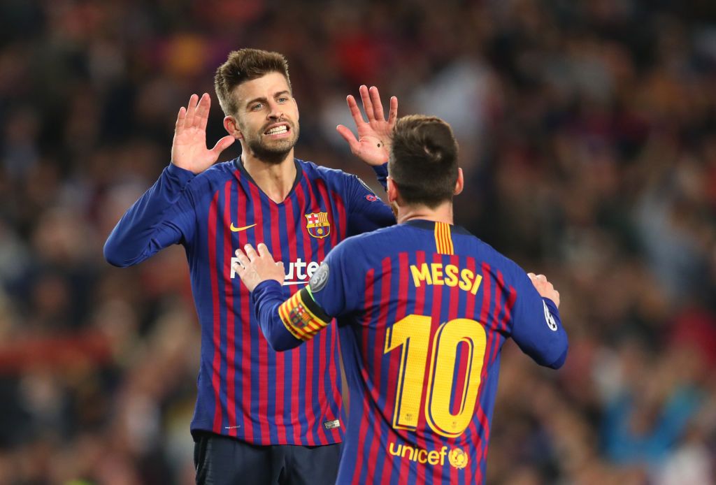 BARCELONA, SPAIN - JANUARY 04:  Lionel Messi of FC Barcelona (R)  celebrates with his teammate Gerard Pique of FC Barcelona after scoring his team's third goal during the round of last 16 Copa del Rey 1st leg match between FC Barcelona and CZ Osasuna at Camp Nou on January 4, 2012 in Barcelona, Spain.  (Photo by David Ramos/Getty Images)