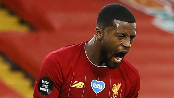 Wijnaldum LIVERPOOL, ENGLAND - JULY 22: Georginio Wijnaldum of Liverpool celebrates after scoring his teams third goal during the Premier League match between Liverpool FC and Chelsea FC at Anfield on July 22, 2020 in Liverpool, England. Football Stadiums around Europe remain empty due to the Coronavirus Pandemic as Government social distancing laws prohibit fans inside venues resulting in all fixtures being played behind closed doors. (Photo by Phil Noble/Pool via Getty Images)
