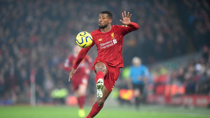 LIVERPOOL, ENGLAND - JANUARY 19: Georginio Wijnaldum of Liverpool controls the ball during the Premier League match between Liverpool FC and Manchester United at Anfield on January 19, 2020 in Liverpool, United Kingdom. (Photo by Michael Regan/Getty Images)