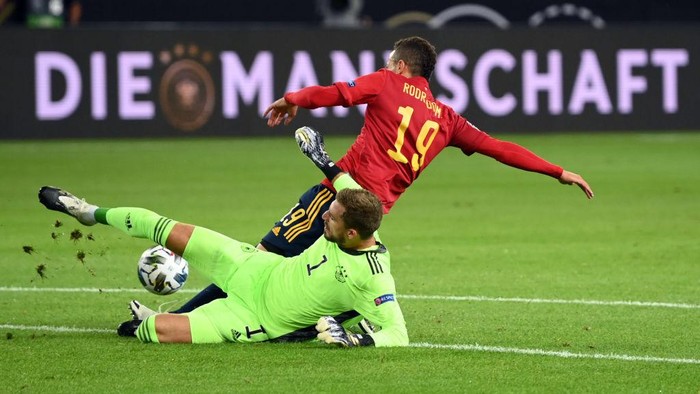 STUTTGART, GERMANY - SEPTEMBER 03: Kevin Trapp of Germany saves a shot from Rodrigo Moreno of Spain during the UEFA Nations League group stage match between Germany and Spain at Mercedes-Benz Arena on September 03, 2020 in Stuttgart, Germany. (Photo by Matthias Hangst/Getty Images)