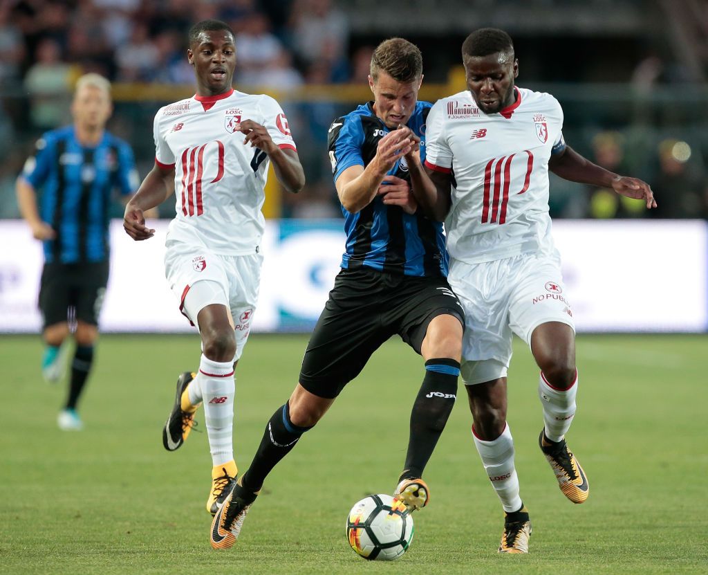 DUISBURG, GERMANY - AUGUST 11: Sergio Reguilon of Sevilla runs with the ball during the UEFA Europa League Quarter Final between Wolves and Sevilla at MSV Arena on August 11, 2020 in Duisburg, Germany. (Photo by Ina Fassbender/Pool via Getty Images)