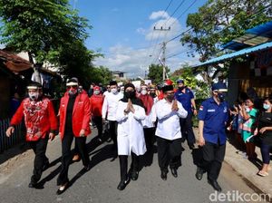 Jalan Kaki, Ipuk-Sugirah Resmi Daftar ke KPU Banyuwangi Jalan Kaki, Ipuk-Sugirah Resmi Daftar ke KPU Banyuwangi