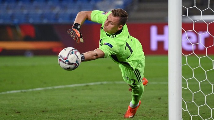 BASEL, SWITZERLAND - SEPTEMBER 06: Goalkeeper Bernd Leno of Germany makes a save during the UEFA Nations League group stage match between Switzerland and Germany at St. Jakob-Park on September 06, 2020 in Basel, Switzerland. (Photo by Matthias Hangst/Getty Images)