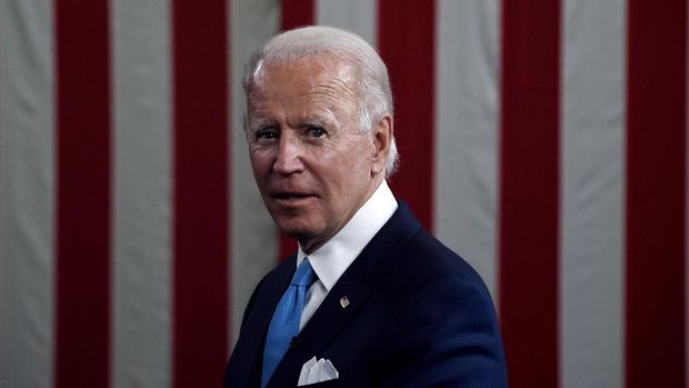 Democratic presidential nominee and former US Vice President Joe Biden participates in a virtual grassroots fundraiser along his vice presidential running mate, US California Senator Kamala Harris, at the Hotel du Pont in Wilmington, Delaware on August 12, 2020. (Photo by Olivier DOULIERY / AFP)