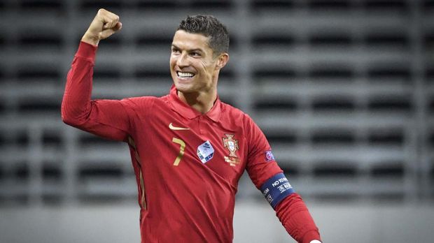 Portugal's Ronaldo celebrates after scoring against Sweden, his 100th goal, during the UEFA Nations League Group stage soccer match at Friends Arena in Stockholm, Sweden, Tuesday Sept. 8, 2020. (Janerik Henriksson / TT via AP)