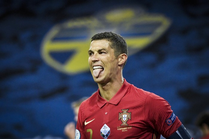 Portugals Cristiano Ronaldo sticks out his tongue during the Portugal against Sweden UEFA Nations League Group stage soccer match at Friends Arena in Stockholm, Sweden, Tuesday Sept. 8, 2020. (Janerik Henriksson/TT via AP)