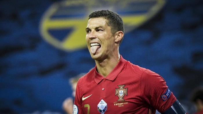 Portugals Cristiano Ronaldo sticks out his tongue during the Portugal against Sweden UEFA Nations League Group stage soccer match at Friends Arena in Stockholm, Sweden, Tuesday Sept. 8, 2020. (Janerik Henriksson/TT via AP)