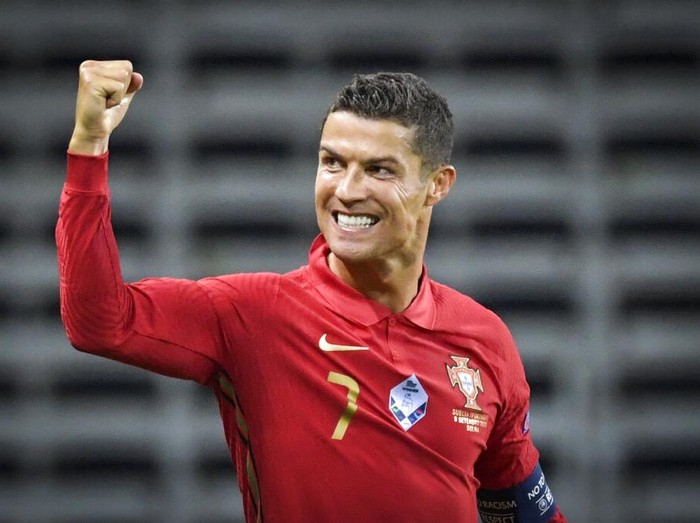 Portugals Ronaldo celebrates after scoring against Sweden during their UEFA Nations League Group stage soccer match at Friends Arena in Stockholm, Sweden, Tuesday Sept. 8, 2020. (Janerik Henriksson / TT via AP)