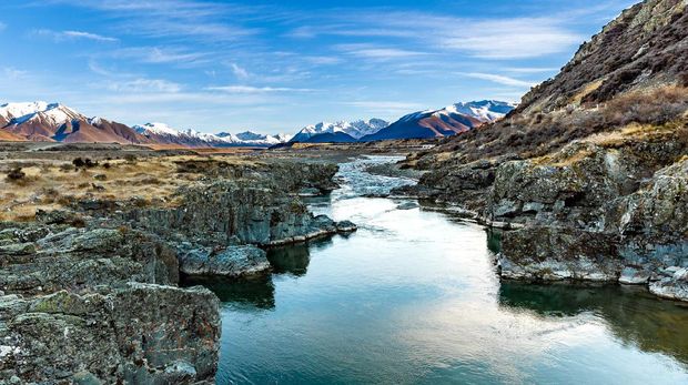 Ahuriri River in New Zealand.  Cool Autumn Morning in Paradise Looking Towards the Mountain Range