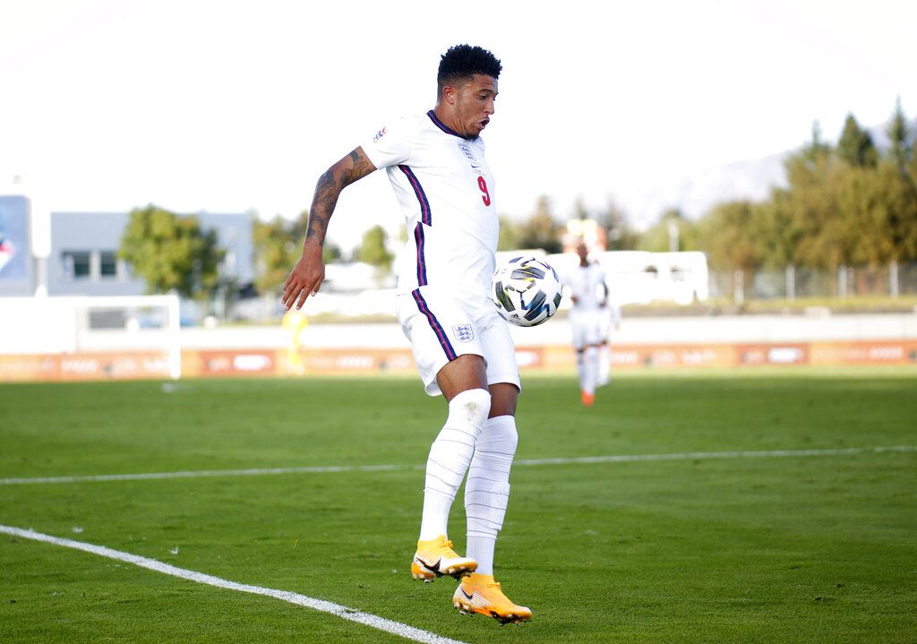 England's Jadon Sancho controls the ball during the UEFA Nations League soccer match between Iceland and England in Reykjavik, Iceland, Saturday, Sept. 5, 2020. (AP Photo/Brynjar Gunnarson)