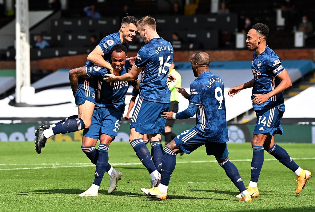 LONDON, ENGLAND - SEPTEMBER 12: Gabriel of Arsenal celebrates with his team mates after scoring his team's second goal during the Premier League match between Fulham and Arsenal at Craven Cottage on September 12, 2020 in London, England. (Photo by Ben Stansall - Pool/Getty Images)