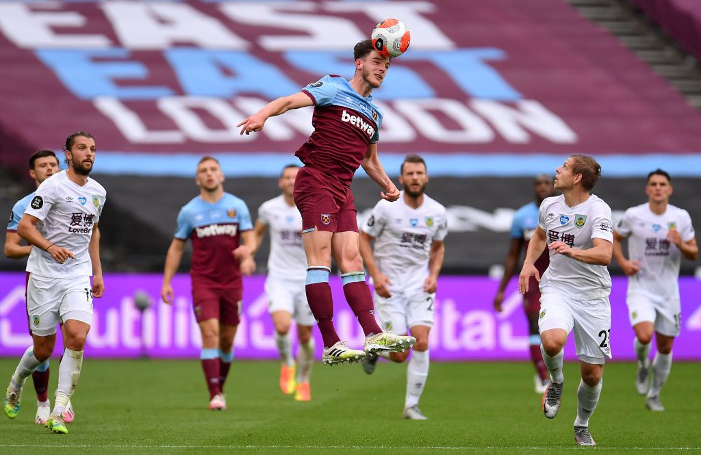LONDON, ENGLAND - JULY 17: Declan Rice of West Ham United celebrates after scoring his team's third goal during the Premier League match between West Ham United and Watford FC at London Stadium on July 17, 2020 in London, England. Football Stadiums around Europe remain empty due to the Coronavirus Pandemic as Government social distancing laws prohibit fans inside venues resulting in all fixtures being played behind closed doors. (Photo by Adam Davy/Pool via Getty Images)