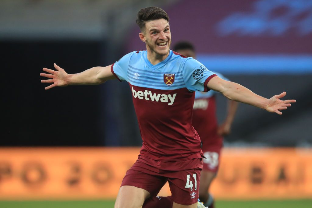 LONDON, ENGLAND - JULY 17: Declan Rice of West Ham United celebrates after scoring his team's third goal during the Premier League match between West Ham United and Watford FC at London Stadium on July 17, 2020 in London, England. Football Stadiums around Europe remain empty due to the Coronavirus Pandemic as Government social distancing laws prohibit fans inside venues resulting in all fixtures being played behind closed doors. (Photo by Adam Davy/Pool via Getty Images)