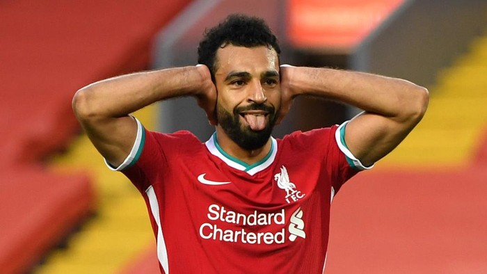 LIVERPOOL, ENGLAND - SEPTEMBER 12: Mohamed Salah of Liverpool celebrates after scoring his teams fourth goal during the Premier League match between Liverpool and Leeds United at Anfield on September 12, 2020 in Liverpool, England. (Photo by Shaun Botterill/Getty Images)