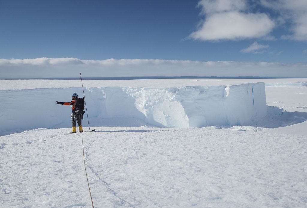 In this handout photo provided by British Antarctic Survey, field guide Andy Hood is seen at the Brunt ice shelf in Antarctica in January 2020. Antarctica remains the only continent without COVID-19 and now in Sept. 2020, as nearly 1,000 scientists and others who wintered over on the ice are seeing the sun for the first time in months, a global effort wants to make sure incoming colleagues don't bring the virus with them. (Robert Taylor/British Antarctic Survey via AP)