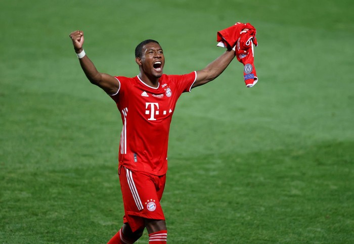 David Alaba LISBON, PORTUGAL - AUGUST 23: David Alaba of FC Bayern Munich celebrates following his team's victory in the UEFA Champions League Final match between Paris Saint-Germain and Bayern Munich at Estadio do Sport Lisboa e Benfica on August 23, 2020 in Lisbon, Portugal. (Photo by Matt Childs/Pool via Getty Images)