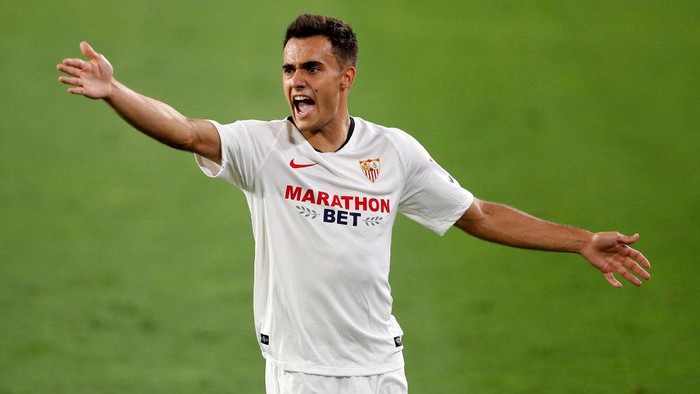 SEVILLE, SPAIN - JULY 12: Sergio Reguilon of Sevilla reacts during the La Liga match between Sevilla FC and RCD Mallorca at Estadio Ramon Sanchez Pizjuan on July 12, 2020 in Seville, Spain. Football Stadiums around Europe remain empty due to the Coronavirus Pandemic as Government social distancing laws prohibit fans inside venues resulting in all fixtures being played behind closed doors. (Photo by Fran Santiago/Getty Images)