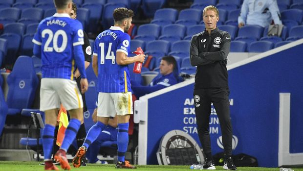 Brighton's head coach Graham Potter watches play during the English Premier League soccer match between Brighton and Chelsea at Falmer Stadium in Brighton, England, Monday, Sept. 14, 2020. (Glynn Kirk/Pool via AP)