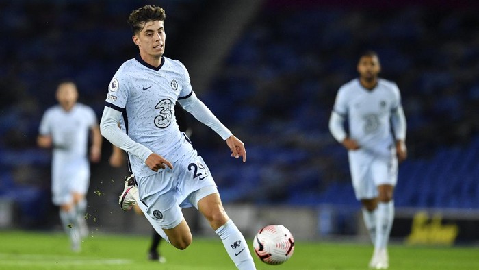 Chelseas Kai Havertz runs after the ball during the English Premier League soccer match between Brighton and Chelsea at Falmer Stadium in Brighton, England, Monday, Sept. 14, 2020. (Glynn Kirk/Pool via AP)