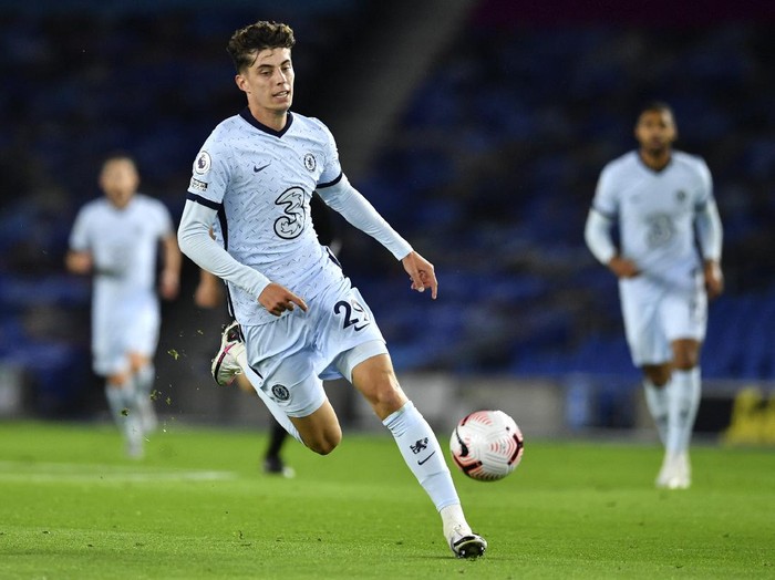 Chelseas Kai Havertz runs after the ball during the English Premier League soccer match between Brighton and Chelsea at Falmer Stadium in Brighton, England, Monday, Sept. 14, 2020. (Glynn Kirk/Pool via AP)