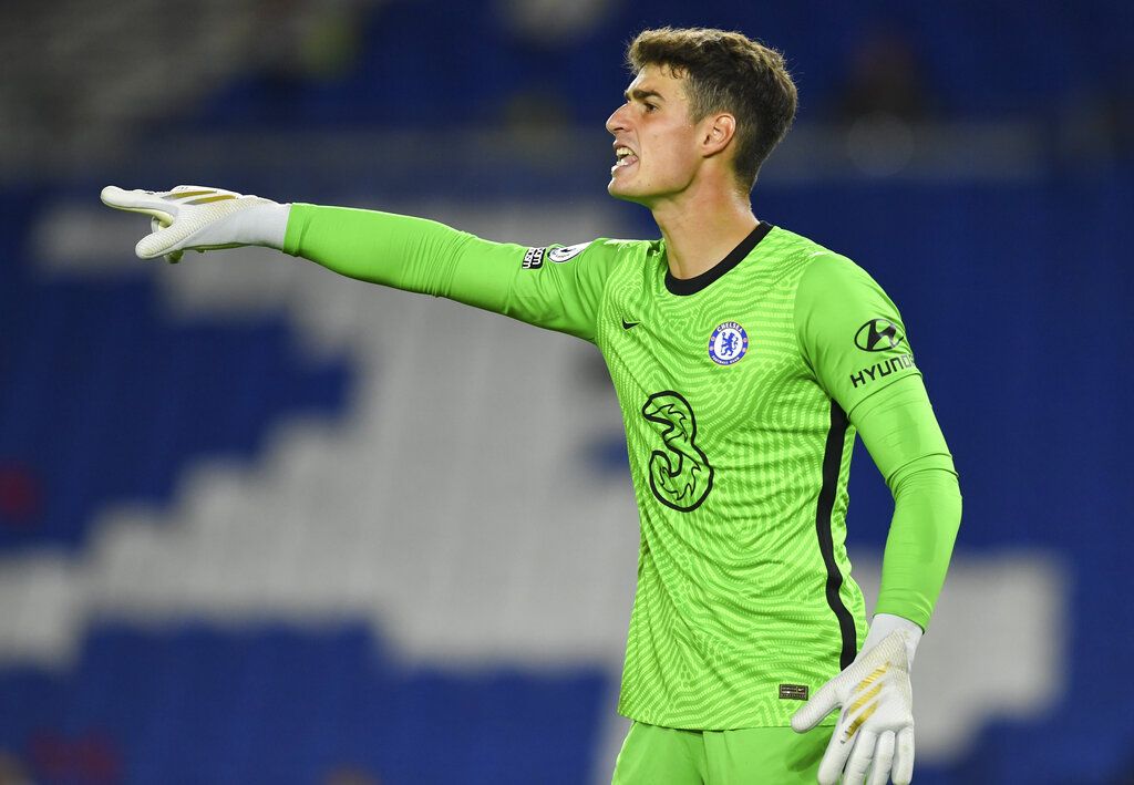 Chelsea's goalkeeper Kepa Arrizabalaga gestures during the English Premier League soccer match between Brighton and Chelsea at Falmer Stadium in Brighton, England, Monday, Sept. 14, 2020. (Glynn Kirk/Pool via AP)