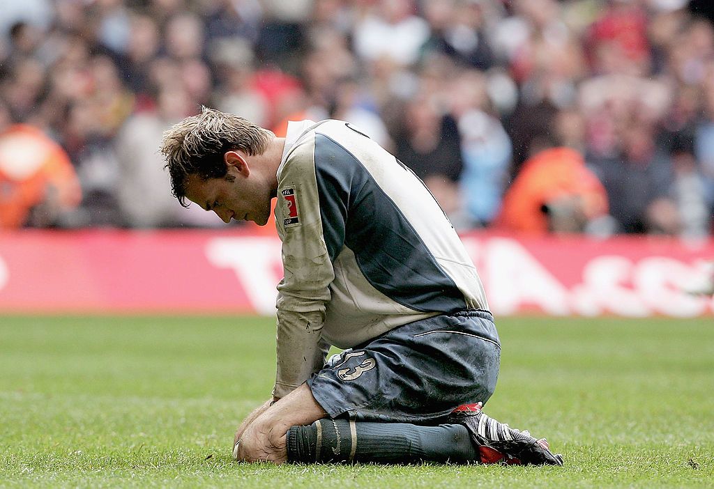 CARDIFF, UNITED KINGDOM - MAY 21:  Goal keeper, Roy Carroll of Manchester United is dejected after losing the FA Cup Final between Arsenal and Manchester United 5-4 on penalties at The Millennium Stadium on May 21, 2005 in Cardiff, Wales.  (Photo by Phil Cole/Getty Images)