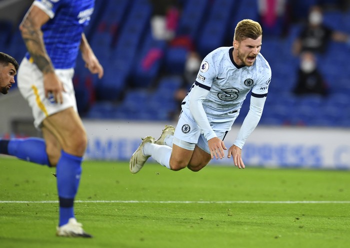 Chelseas Timo Werner reacts after he is fouled by Brightons goalkeeper Mathew Ryan during the English Premier League soccer match between Brighton and Chelsea at Falmer Stadium in Brighton, England, Monday, Sept. 14, 2020. (Glynn Kirk/Pool via AP)