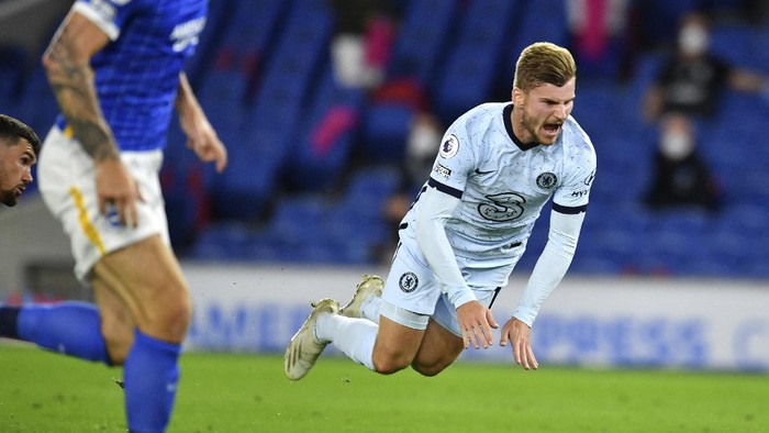 Chelseas Timo Werner reacts after he is fouled by Brightons goalkeeper Mathew Ryan during the English Premier League soccer match between Brighton and Chelsea at Falmer Stadium in Brighton, England, Monday, Sept. 14, 2020. (Glynn Kirk/Pool via AP)