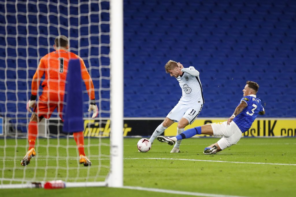 BRIGHTON, ENGLAND - SEPTEMBER 14: Ben White of Brighton and Hove Albion gets injured during a challenge on Timo Werner of Chelsea during the Premier League match between Brighton & Hove Albion and Chelsea at American Express Community Stadium on September 14, 2020 in Brighton, England. (Photo by Peter Cziborra/Pool via Getty Images)
