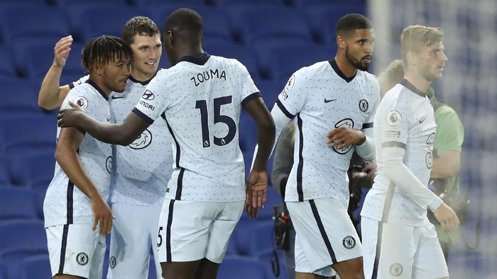 Chelseas Reece James, left, is congratulated by teammates after scoring his teams second goal during the English Premier League soccer match between Brighton and Chelsea at Falmer Stadium in Brighton, England, Monday, Sept. 14, 2020. (Peter Cziborra/Pool via AP)
