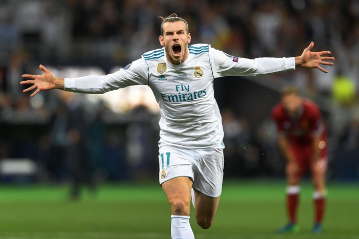Gareth Bale KIEV, UKRAINE - MAY 26: Gareth Bale of Real Madrid celebrates scoring his side's second goal during the UEFA Champions League Final between Real Madrid and Liverpool at NSC Olimpiyskiy Stadium on May 26, 2018 in Kiev, Ukraine. (Photo by Michael Regan/Getty Images)