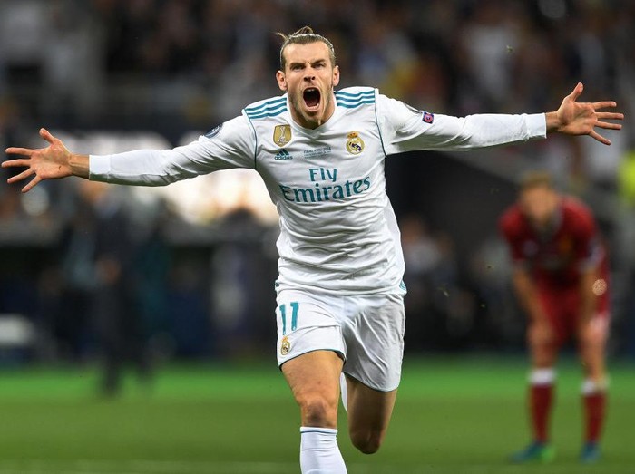 KIEV, UKRAINE - MAY 26:   Gareth Bale of Real Madrid celebrates scoring his side's second goal during the UEFA Champions League Final between Real Madrid and Liverpool at NSC Olimpiyskiy Stadium on May 26, 2018 in Kiev, Ukraine. (Photo by Michael Regan/Getty Images)