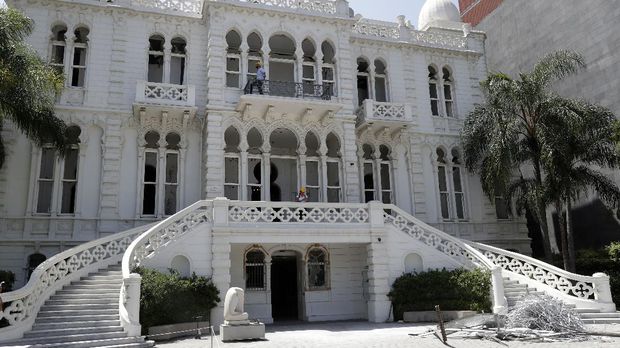 This picture taken on August 8, 2020 shows a view of the facade of the damaged Sursock Museum in the neighbourhood of Ashrafiyeh in Lebanon's capital Beirut, with empty windows after their stained glass was broken in the aftermath of the massive blast at the port of Beirut which ravaged entire neighbourhoods of the city. - The mansion-turned-museum of Sursock, which only a few months ago was housing a landmark Picasso exhibition, now tells the story of a city's demise. Many of old Beirut's remaining landmarks had already been damaged by 15 years of civil war and decades of government neglect. The August 4 blast finished the job. The chemical disaster, which appears to have been the result of government negligence, was so powerful that it literally redrew Beirut's coastline and skyline. (Photo by ANWAR AMRO / AFP)